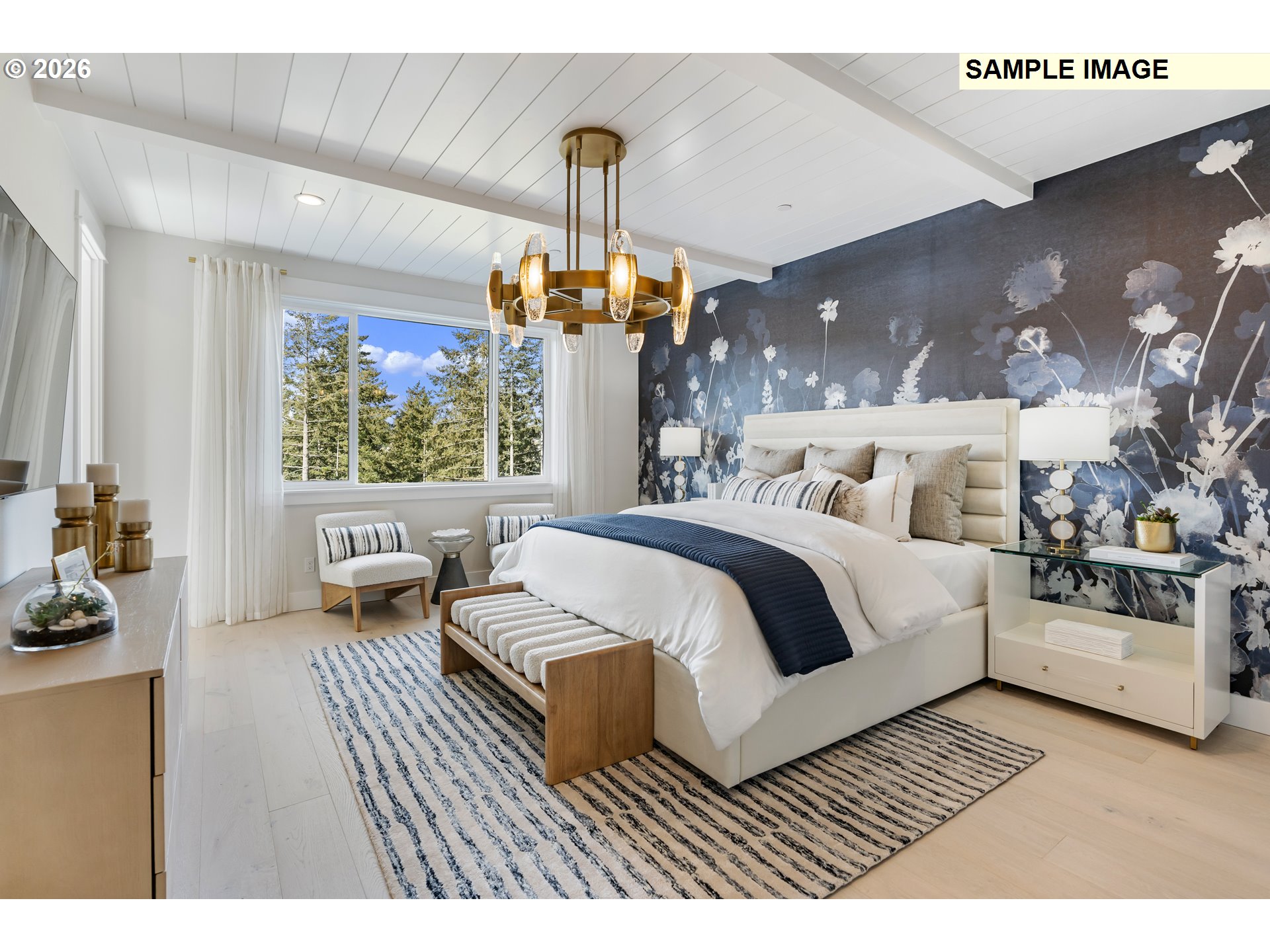 1509 South Creekview Place, Unit L6 Ridgefield, WA 98642 - Photo 22 of 44 a spacious bedroom with a bed a couch and chandelier