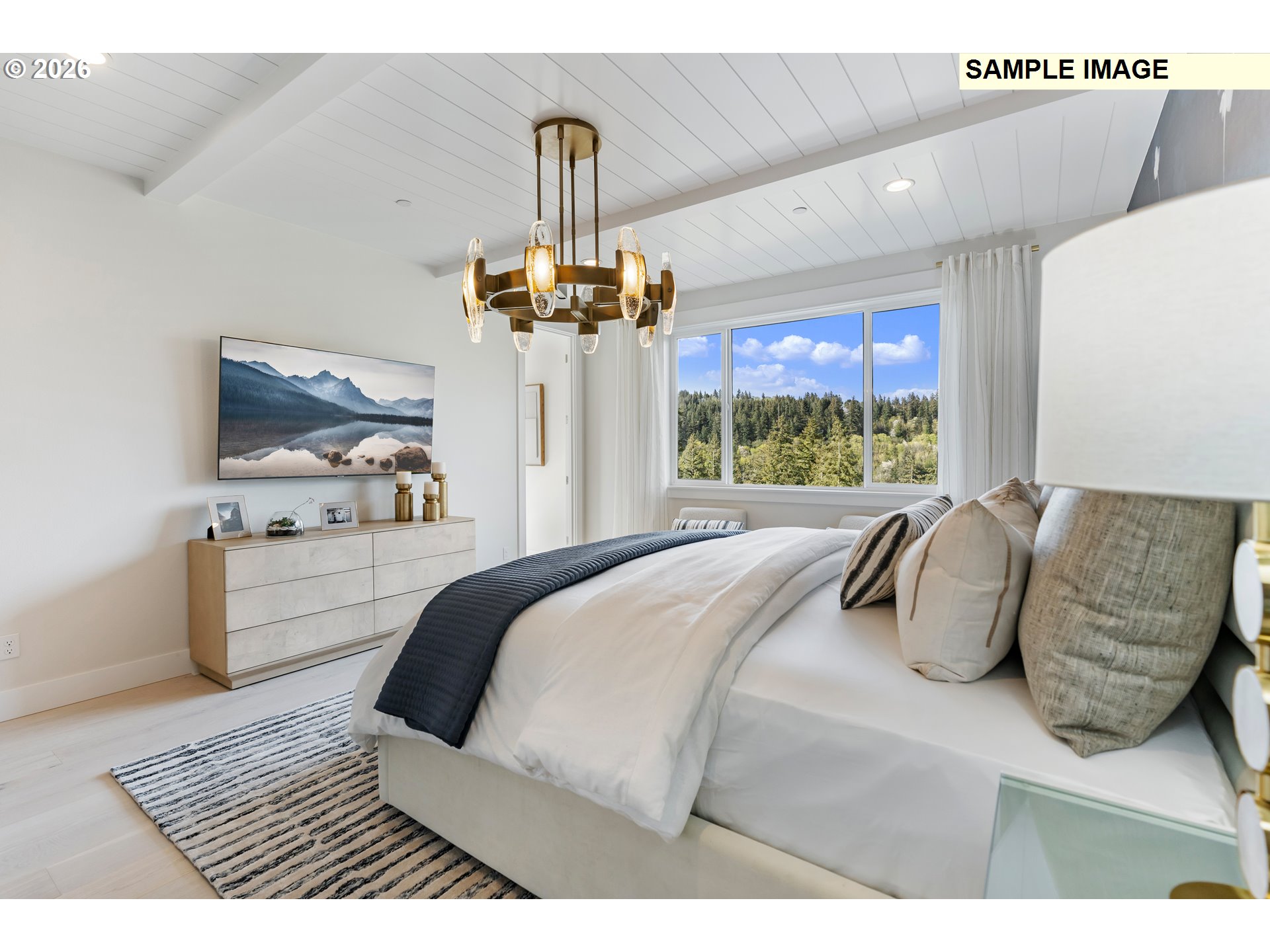 1509 South Creekview Place, Unit L6 Ridgefield, WA 98642 - Photo 23 of 44 a bedroom with a bed and wooden floor