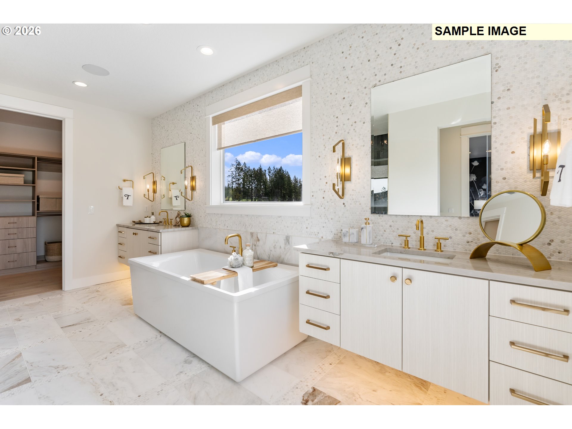 1509 South Creekview Place, Unit L6 Ridgefield, WA 98642 - Photo 25 of 44 a spacious bathroom with a double vanity sink a mirror and a bathtub