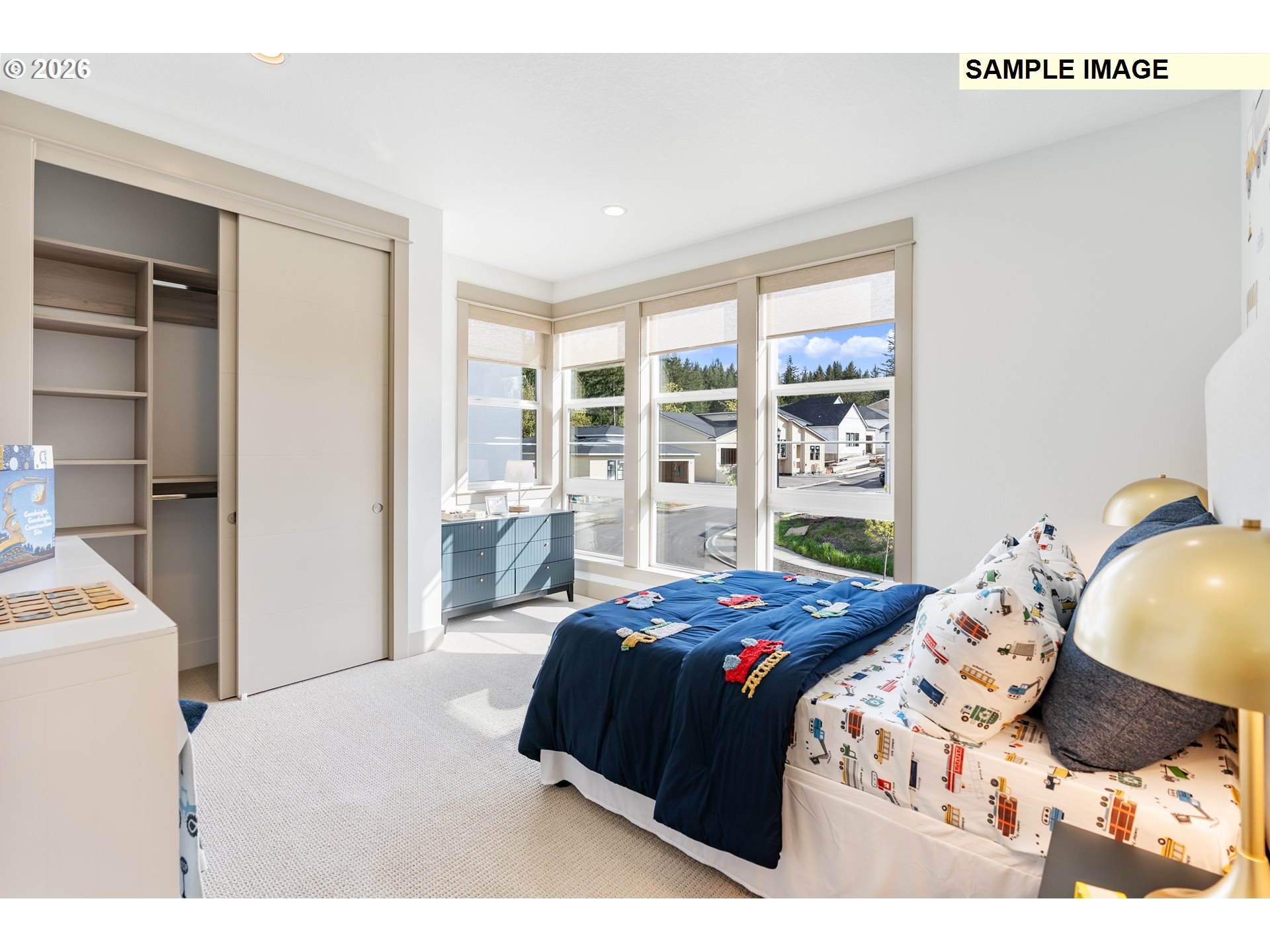 1509 South Creekview Place, Unit L6 Ridgefield, WA 98642 - Photo 33 of 44 a bedroom with a bed and a cabinets