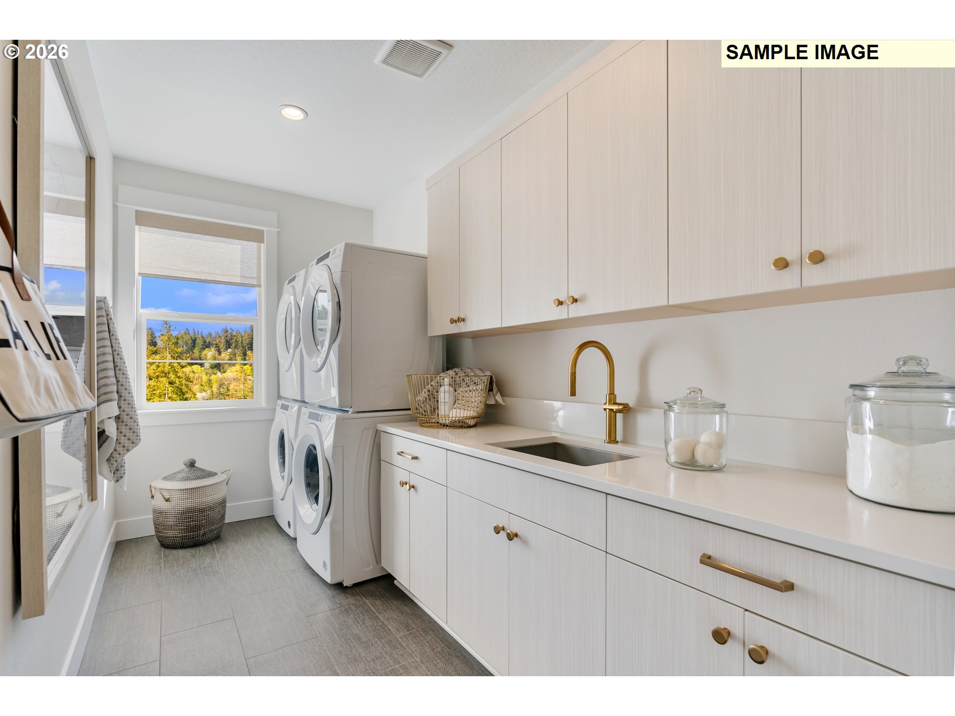 1509 South Creekview Place, Unit L6 Ridgefield, WA 98642 - Photo 35 of 44 a kitchen with sink and cabinets