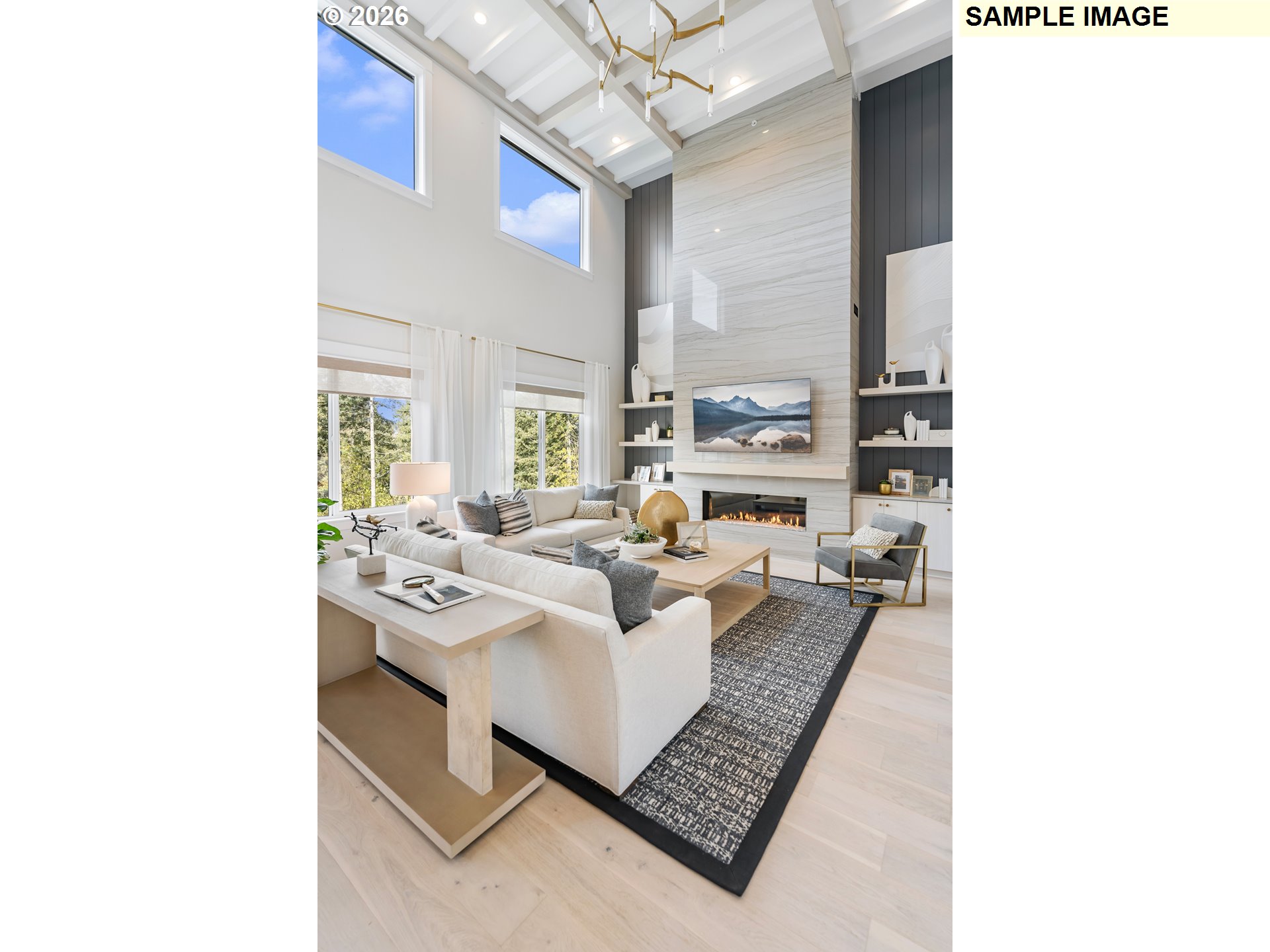 1509 South Creekview Place, Unit L6 Ridgefield, WA 98642 - Photo 36 of 44 a living room with furniture and a table