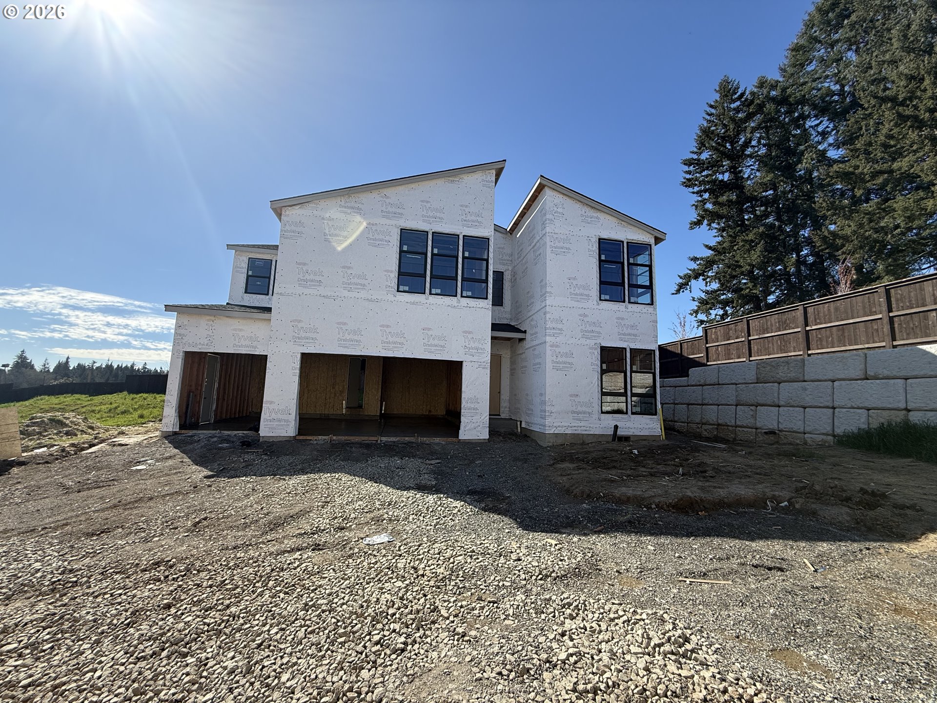 1509 South Creekview Place, Unit L6 Ridgefield, WA 98642 - Photo 43 of 44 a view of a house with a yard