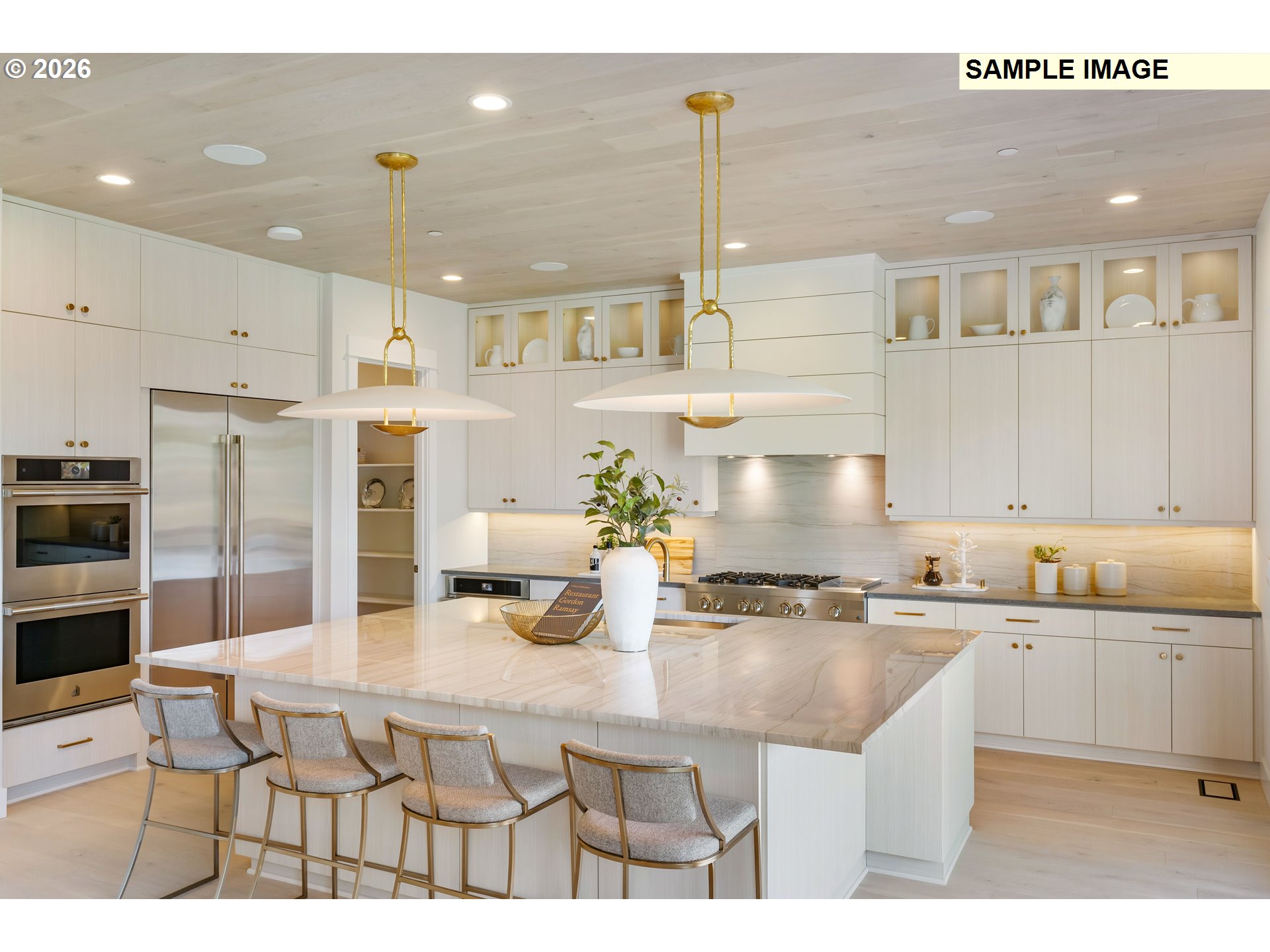 1509 South Creekview Place, Unit L6 Ridgefield, WA 98642 - Photo 8 of 44 a kitchen with stainless steel appliances kitchen island granite countertop a sink and cabinets