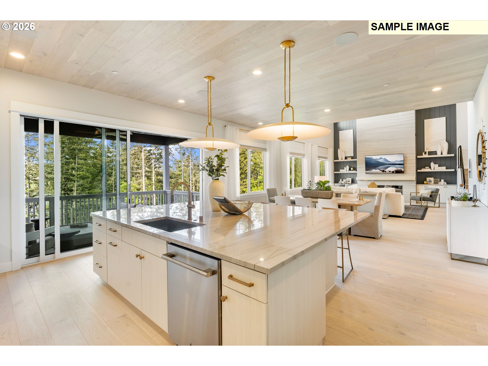 1509 South Creekview Place, Unit L6 Ridgefield, WA 98642 - Photo 9 of 44 a kitchen with a table chairs and a view of living room