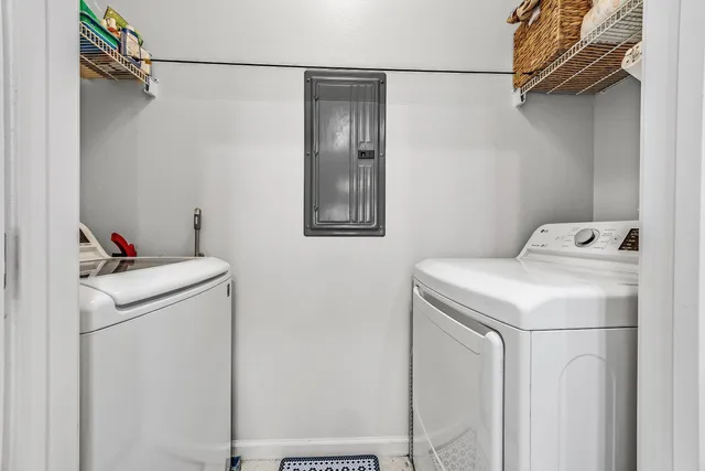 a utility room with dryer and washer