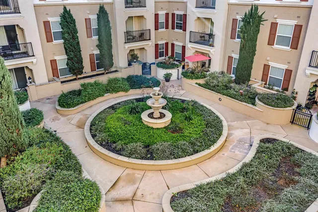 a view of a house with swimming pool