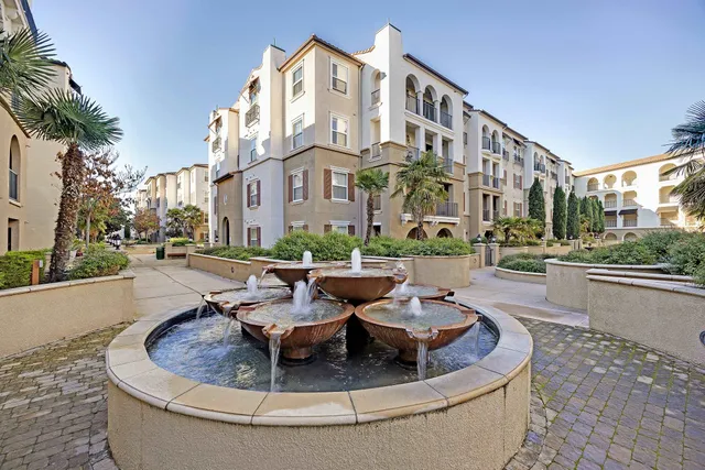a view of a swimming pool with a lounge chairs