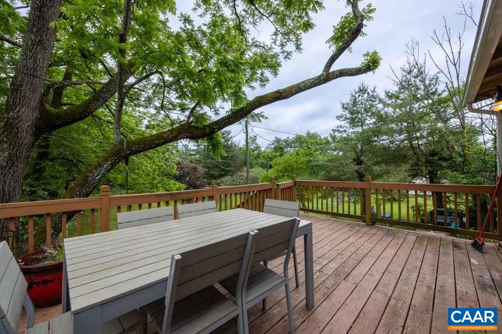 727 Tilman Road Charlottesville, VA 22901 - Photo 27 of 41 a view of house with deck and outdoor seating