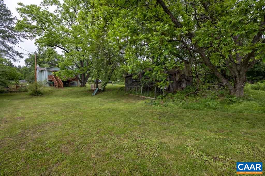 727 Tilman Road Charlottesville, VA 22901 - Photo 30 of 41 a backyard of a house with lots of green space