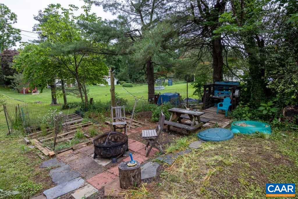 727 Tilman Road Charlottesville, VA 22901 - Photo 33 of 41 a view of a backyard with sitting area and garden