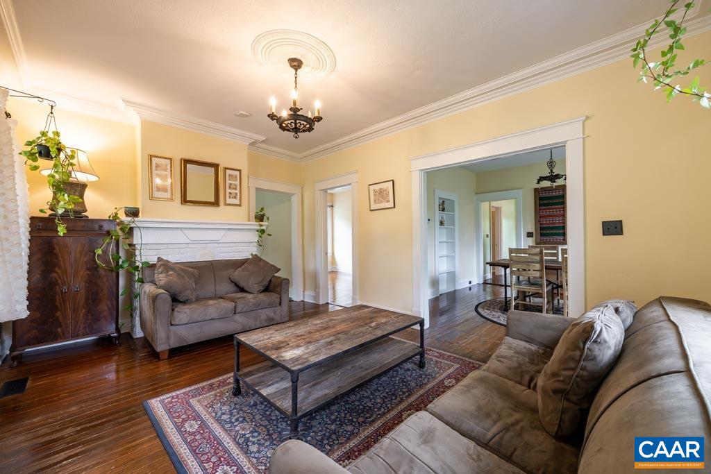 727 Tilman Road Charlottesville, VA 22901 - Photo 6 of 41 a living room with furniture and a wooden floor