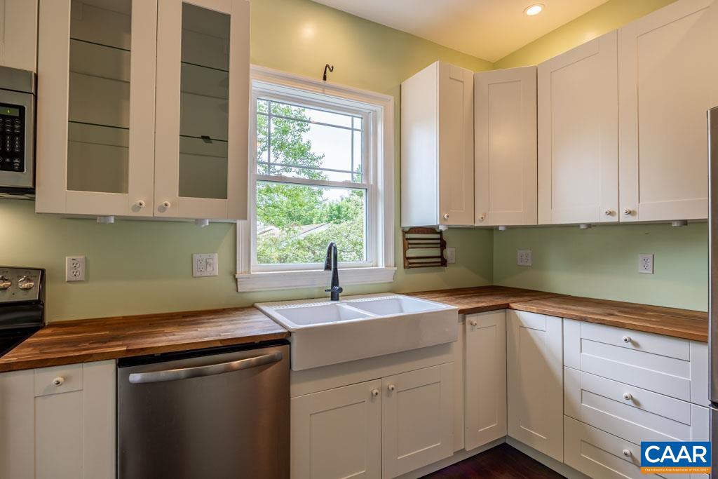 727 Tilman Road Charlottesville, VA 22901 - Photo 10 of 41 a kitchen with a sink and cabinets