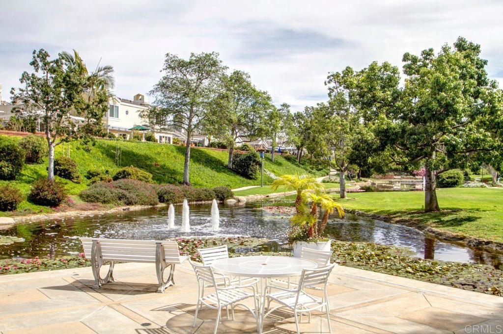 7013 Lavender Way Carlsbad, CA 92011 - Photo 32 of 51 a view of a swimming pool with a patio