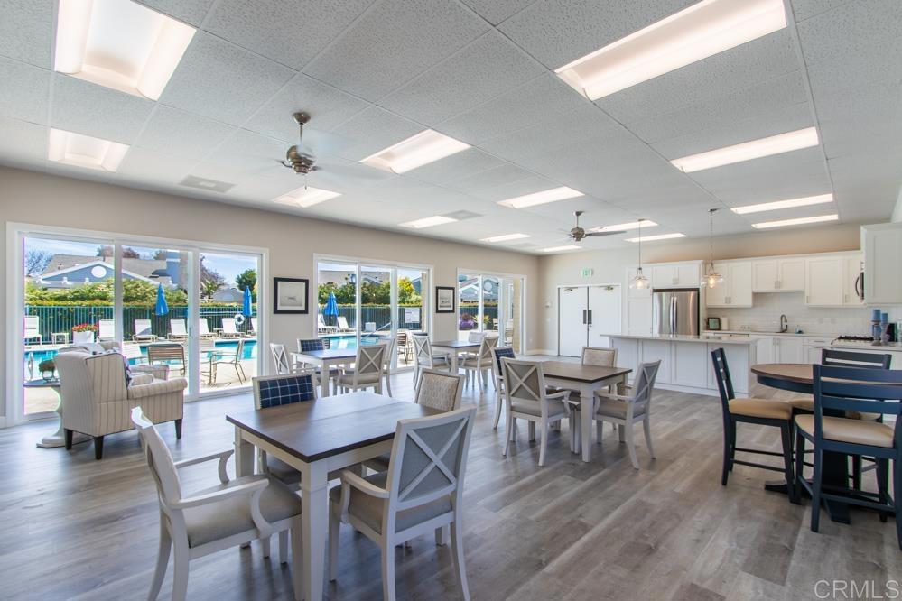 7013 Lavender Way Carlsbad, CA 92011 - Photo 41 of 51 a view of a dining room with furniture window and outside view