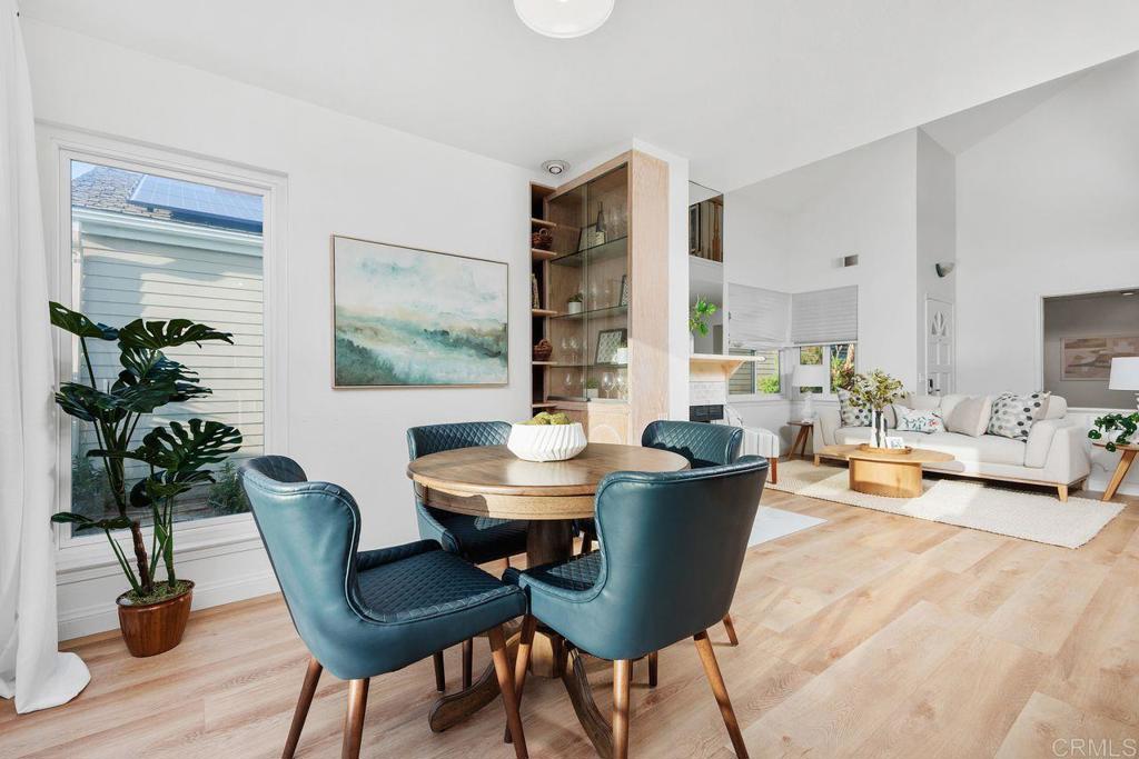 7013 Lavender Way Carlsbad, CA 92011 - Photo 6 of 51 a living room with furniture and wooden floor