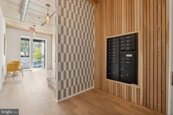 a view of entryway with wooden floor