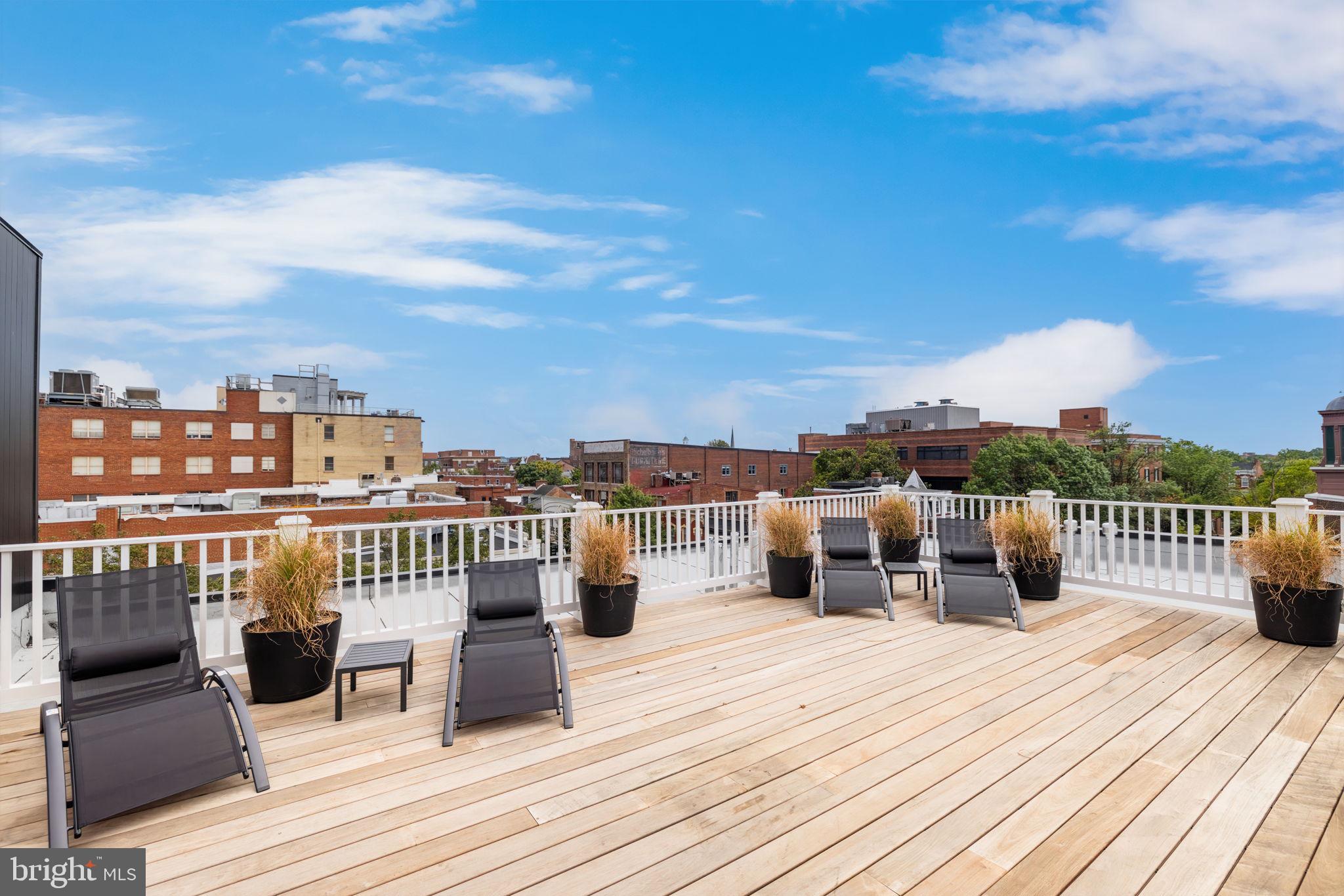 901 King Street, Unit 401 Alexandria, VA 22314 - Photo 10 of 32 a view of a terrace with sitting area