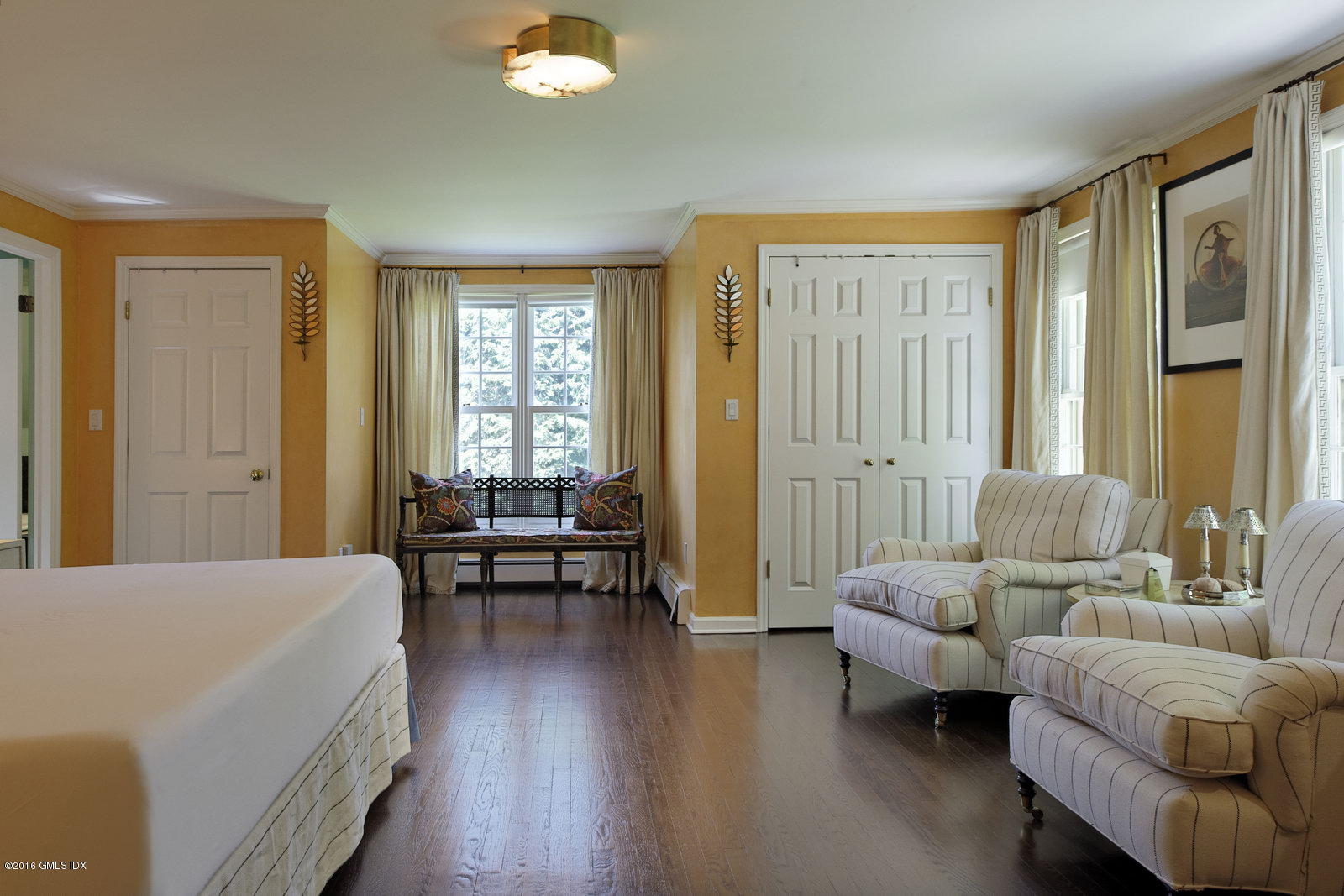 25 Leeward Lane Riverside, CT 06878 - Photo 15 of 19 a living room with furniture and a large window