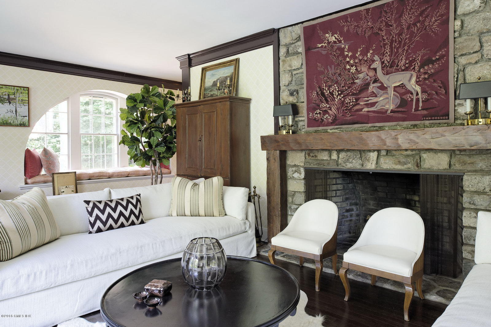 25 Leeward Lane Riverside, CT 06878 - Photo 8 of 19 a living room with furniture and a large window