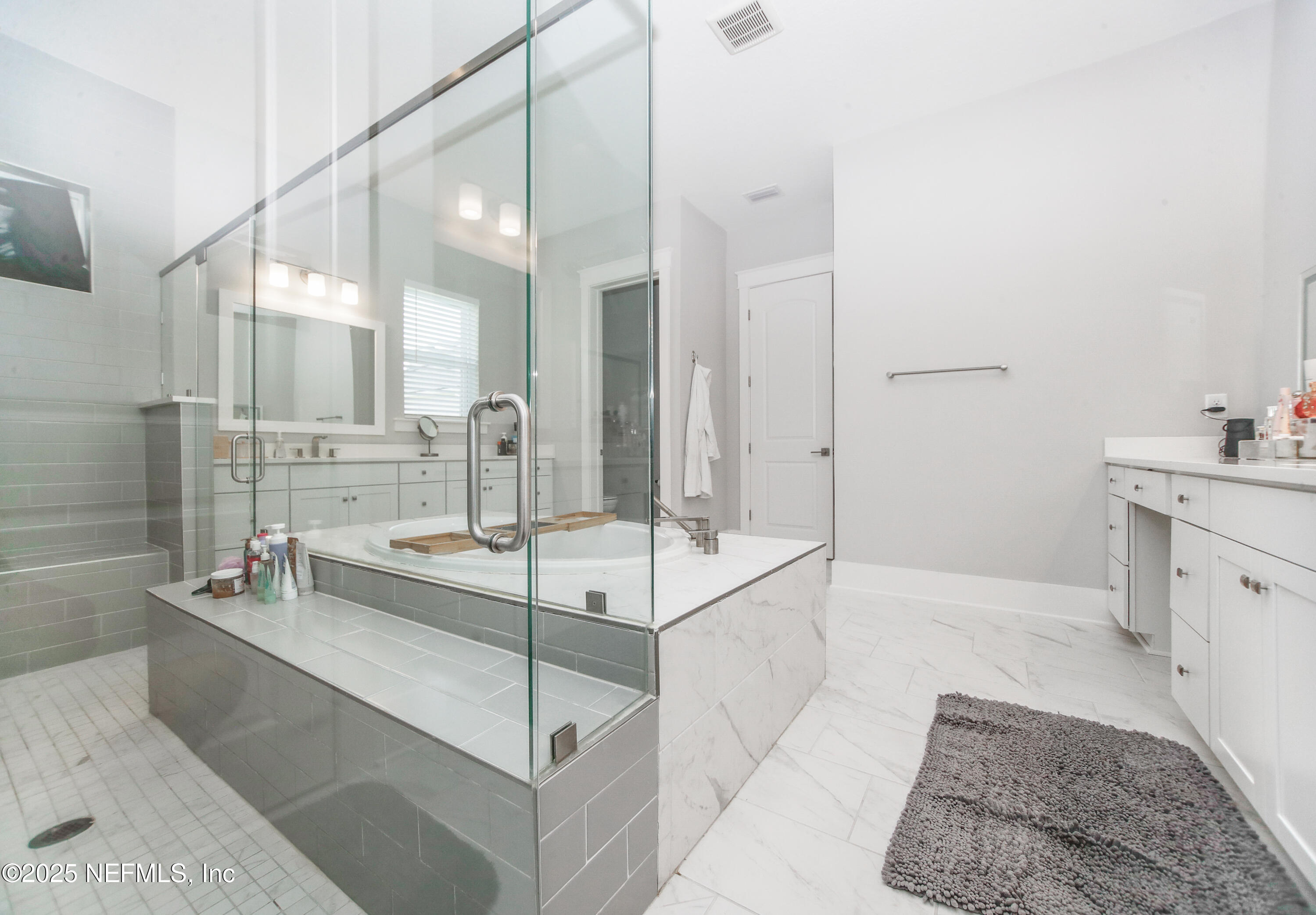 151 Hillendale Circle St. Johns, FL 32259 - Photo 14 of 39 a large bathroom with a large tub and sink