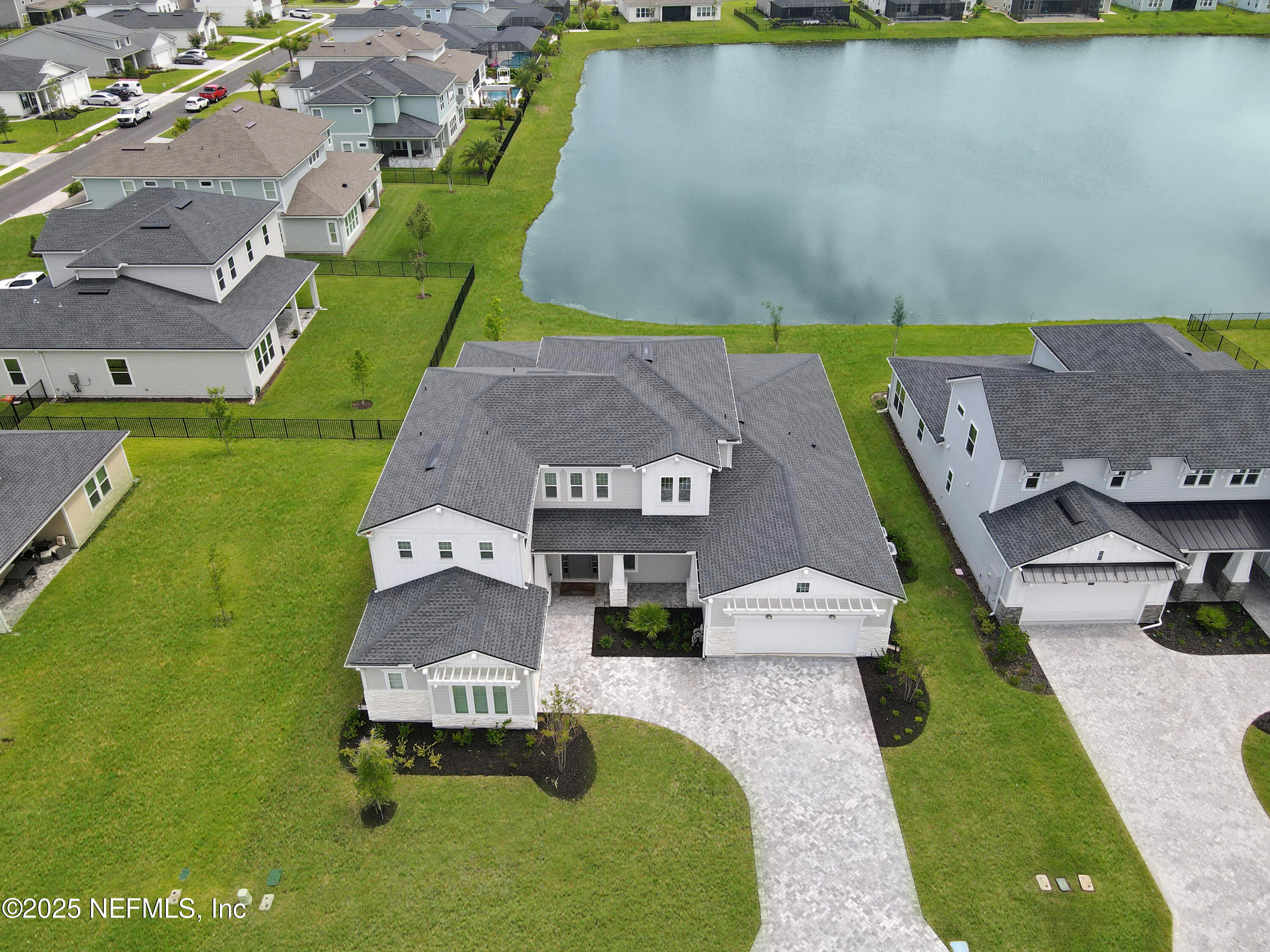 151 Hillendale Circle St. Johns, FL 32259 - Photo 28 of 39 an aerial view of a house with a garden and lake view
