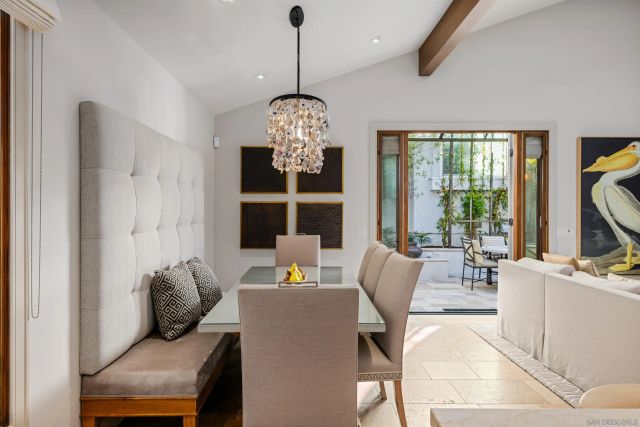 a bedroom with a bed window and couch