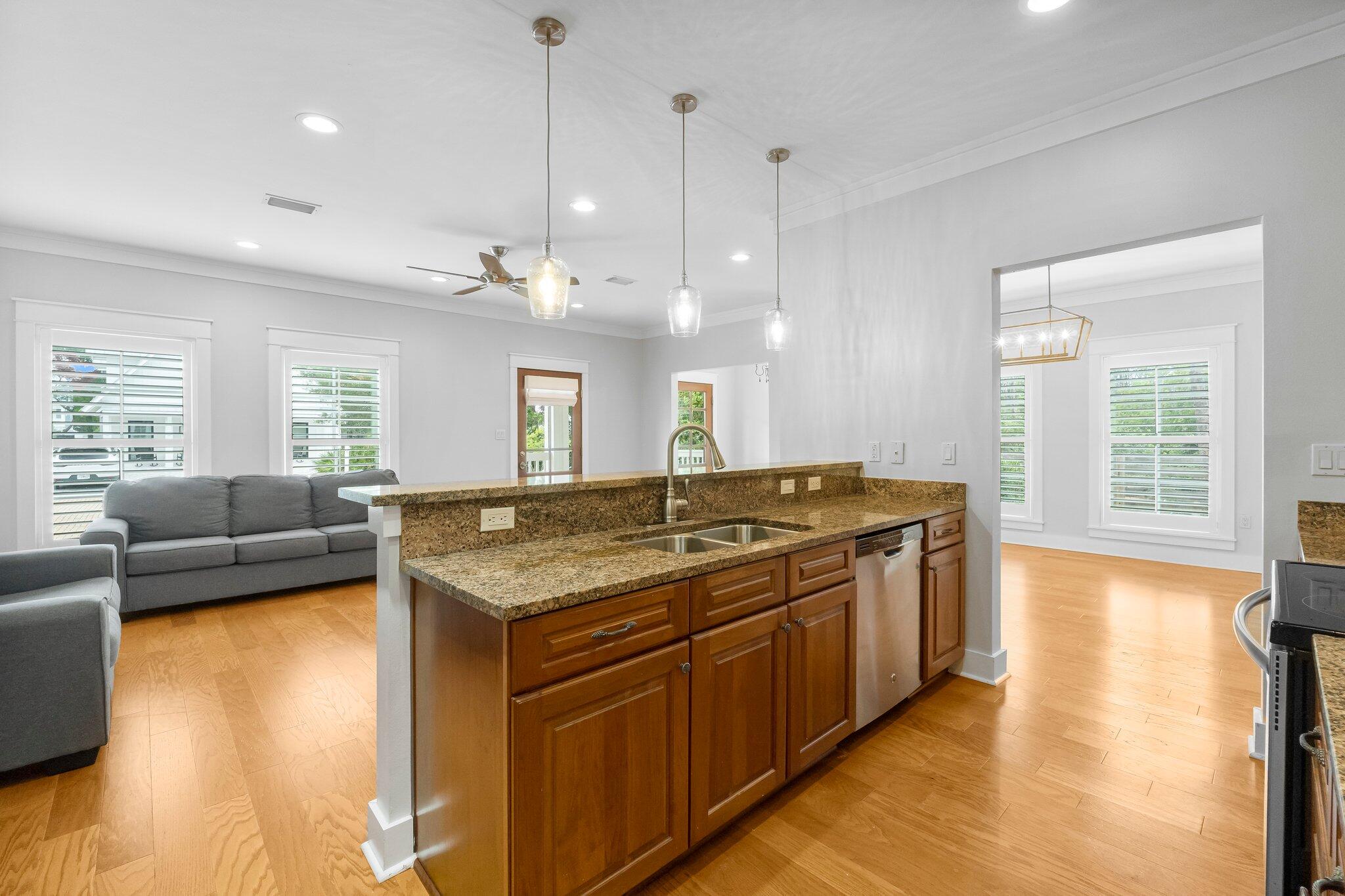 60 Willow Mist Road Inlet Beach, FL 32461 - Photo 15 of 57 a view of a kitchen counter top space with furniture and wooden floor