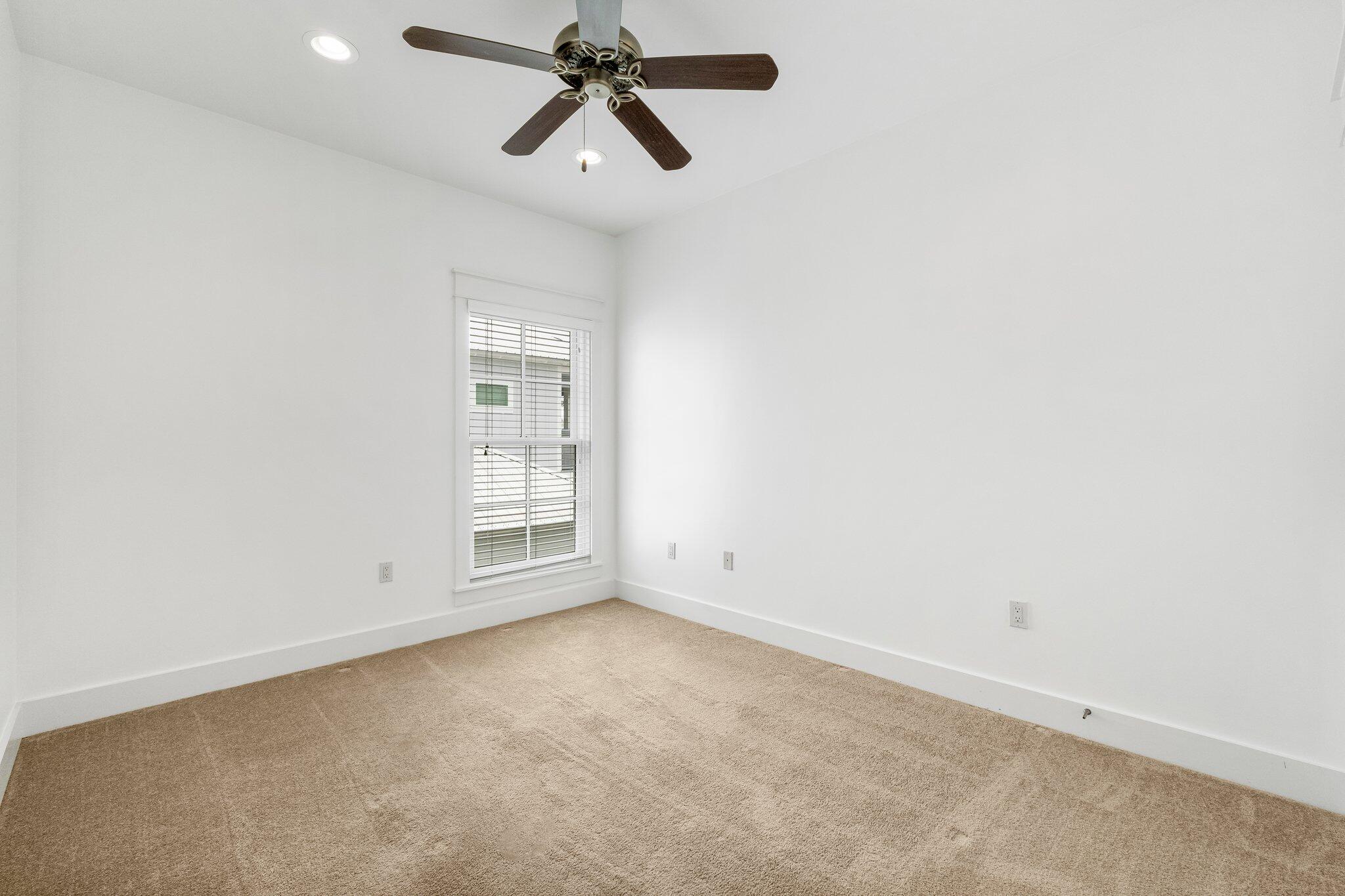 60 Willow Mist Road Inlet Beach, FL 32461 - Photo 27 of 57 an empty room with a window and a fan