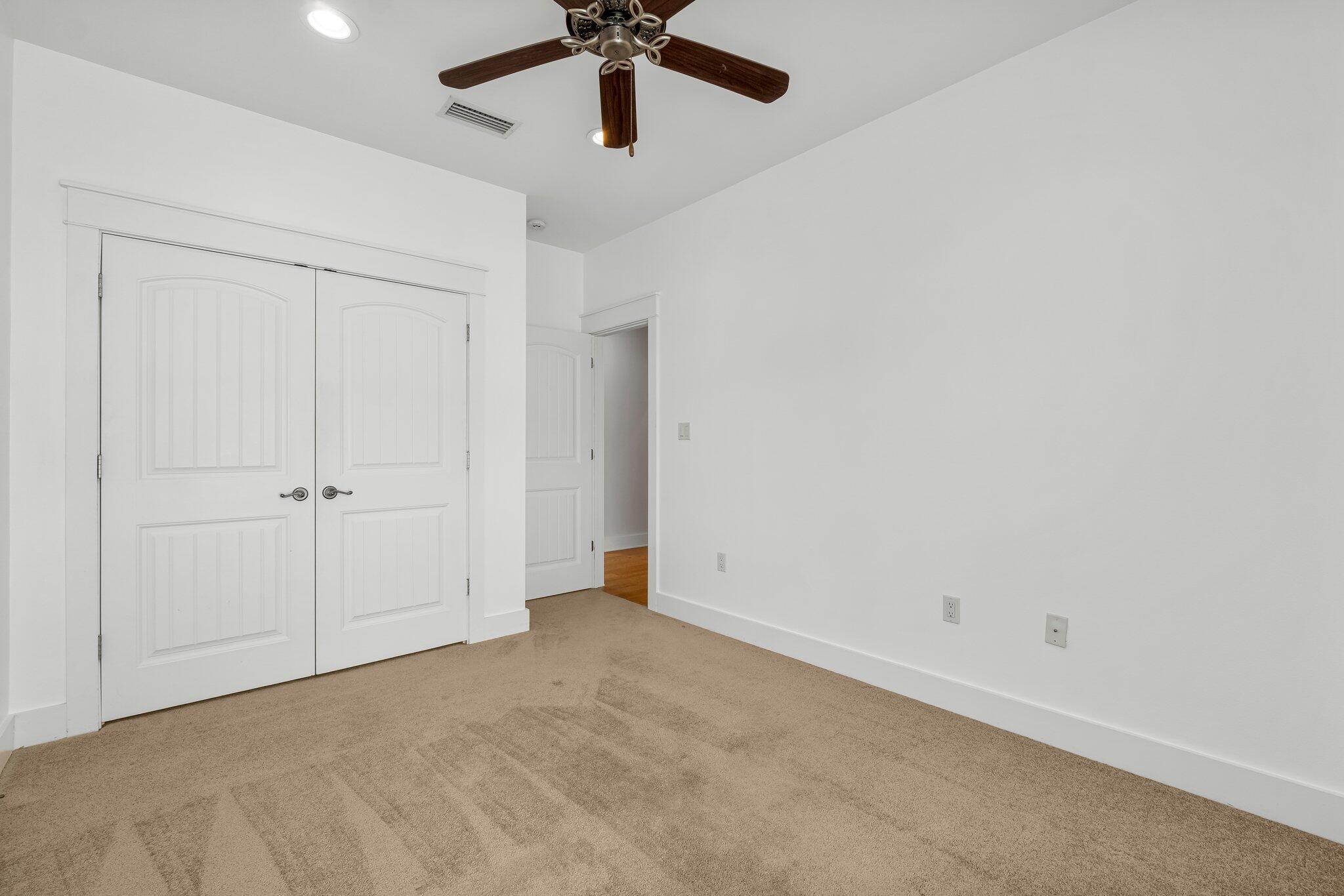60 Willow Mist Road Inlet Beach, FL 32461 - Photo 28 of 57 an empty room with a ceiling fan and a window