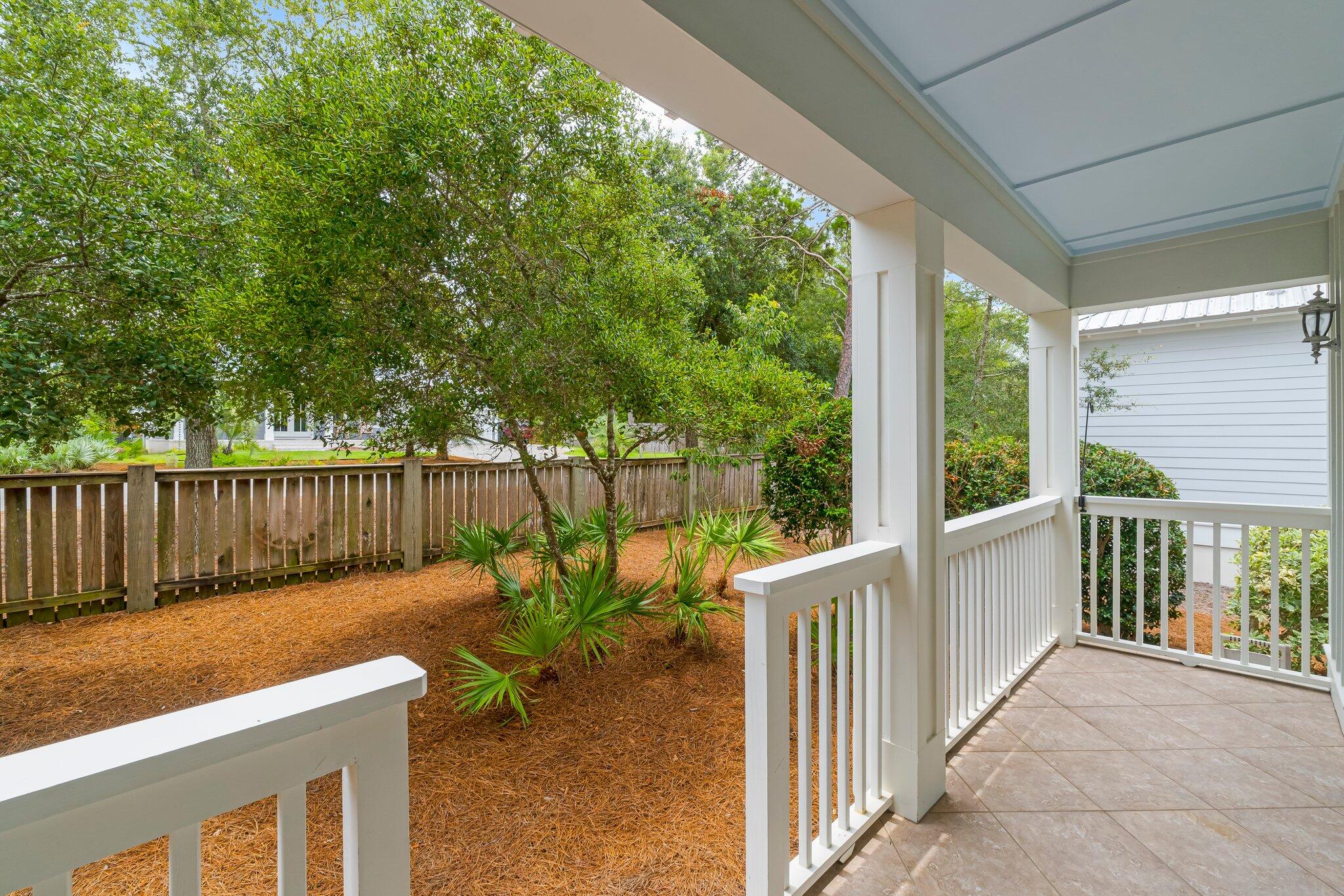 60 Willow Mist Road Inlet Beach, FL 32461 - Photo 34 of 57 a view of a deck with couches wooden floor and fence