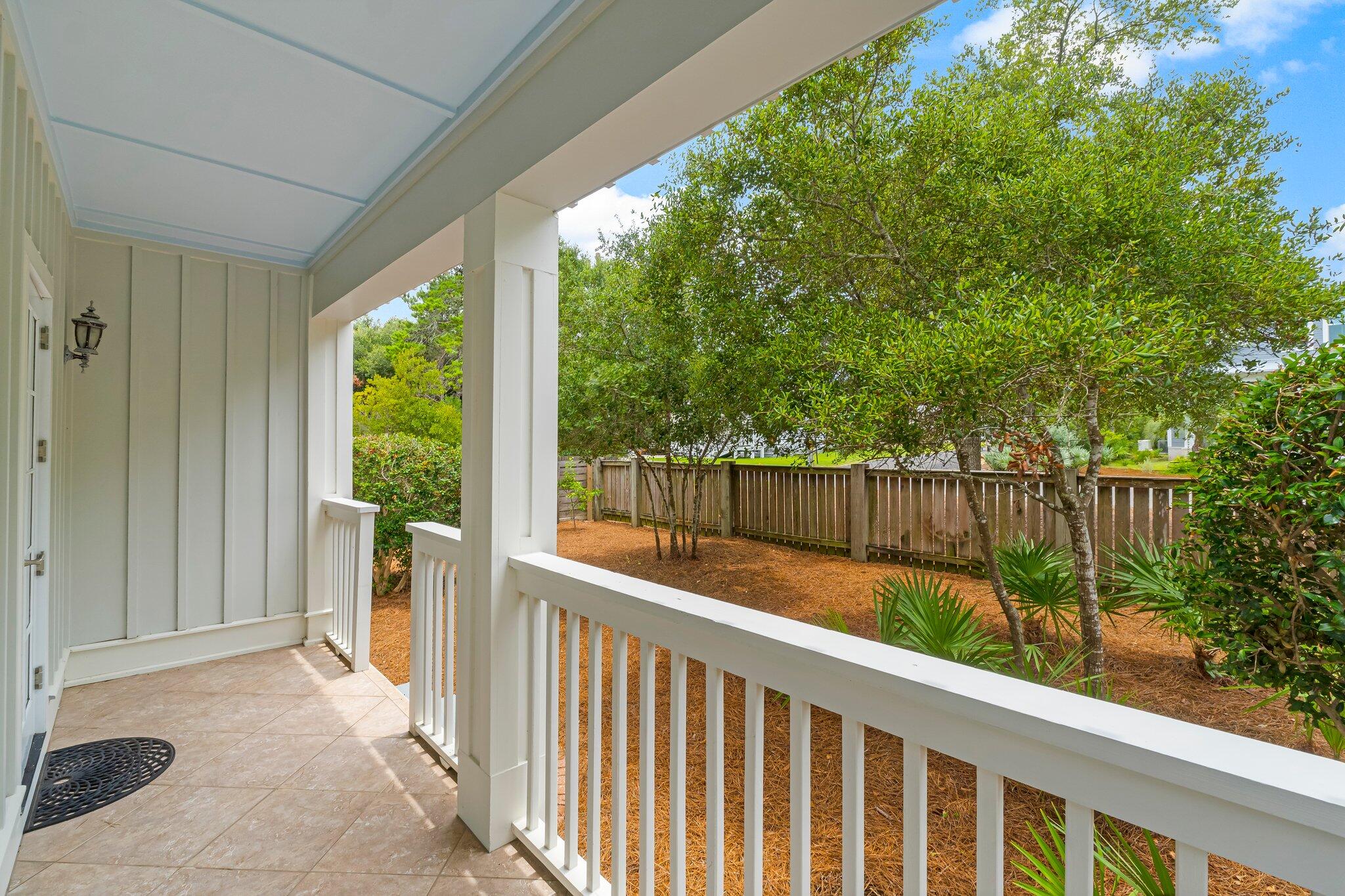 60 Willow Mist Road Inlet Beach, FL 32461 - Photo 36 of 57 a balcony with trees in front of it