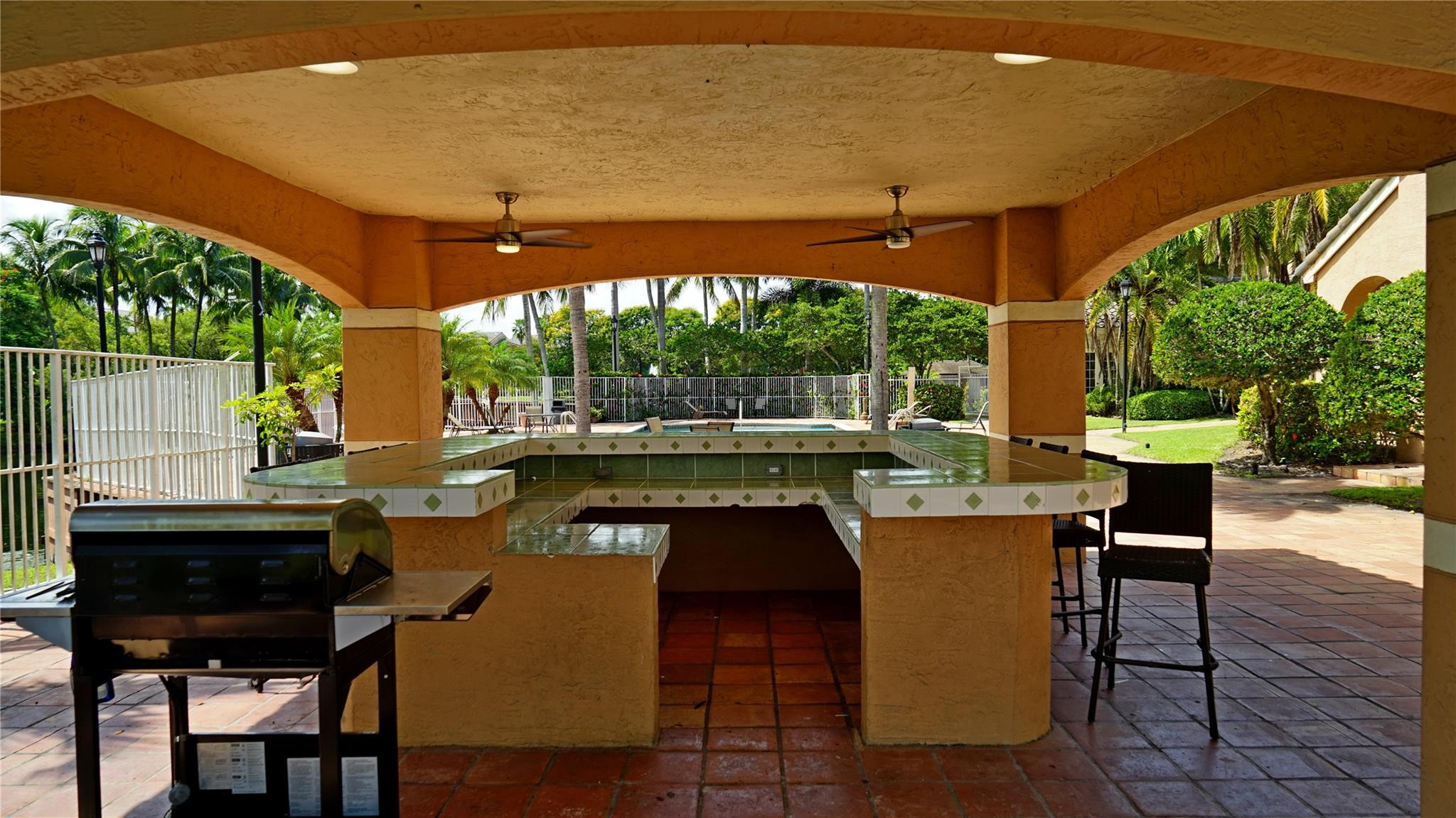 3854 Lyons Road, Unit 3075 Coconut Creek, FL 33073 - Photo 22 of 29 Pool area & BBQ