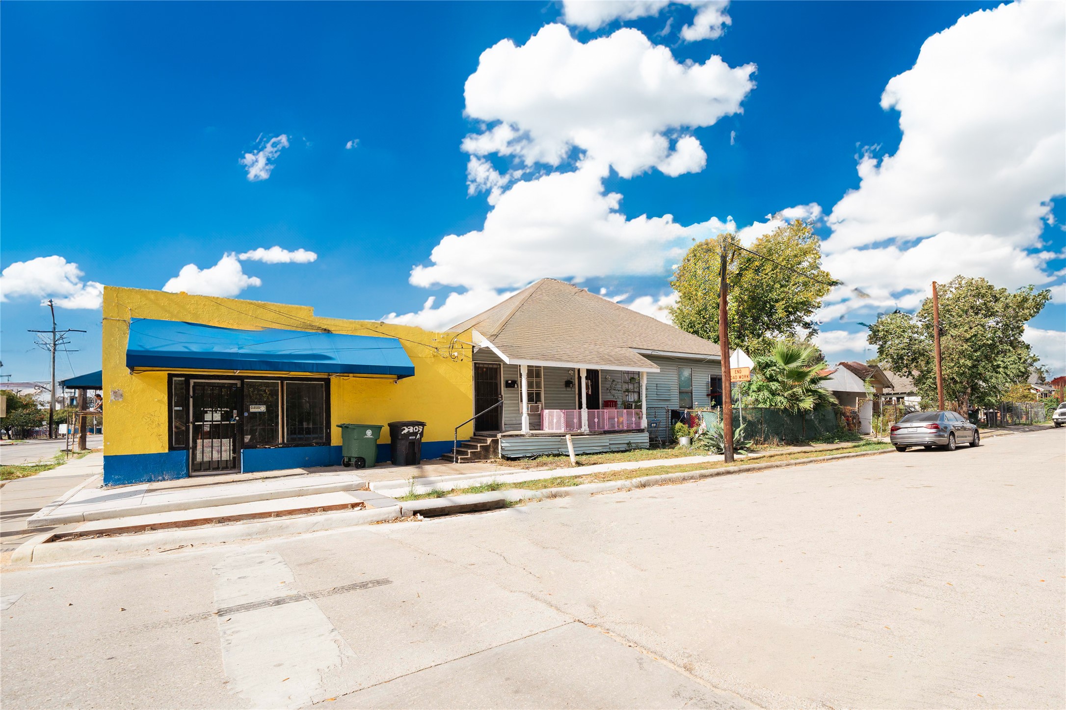 a view of a building with a yard