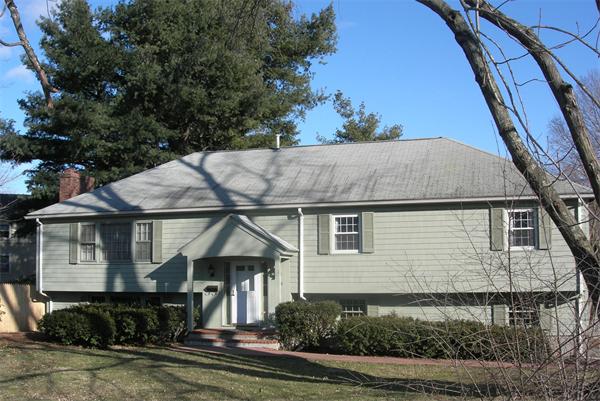 118 Worthen Road Lexington, MA 02421 - Photo 1 of 15 a front view of a house with a yard