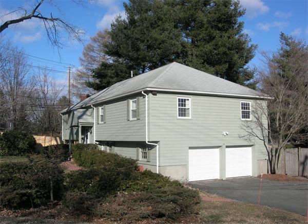 118 Worthen Road Lexington, MA 02421 - Photo 2 of 15 a front view of a house with a garden