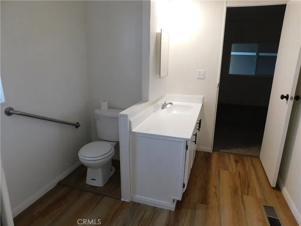 5700 West Wilson Street, Unit 1 Banning, CA 92220 - Photo 32 of 49 a bathroom with a sink and a toilet