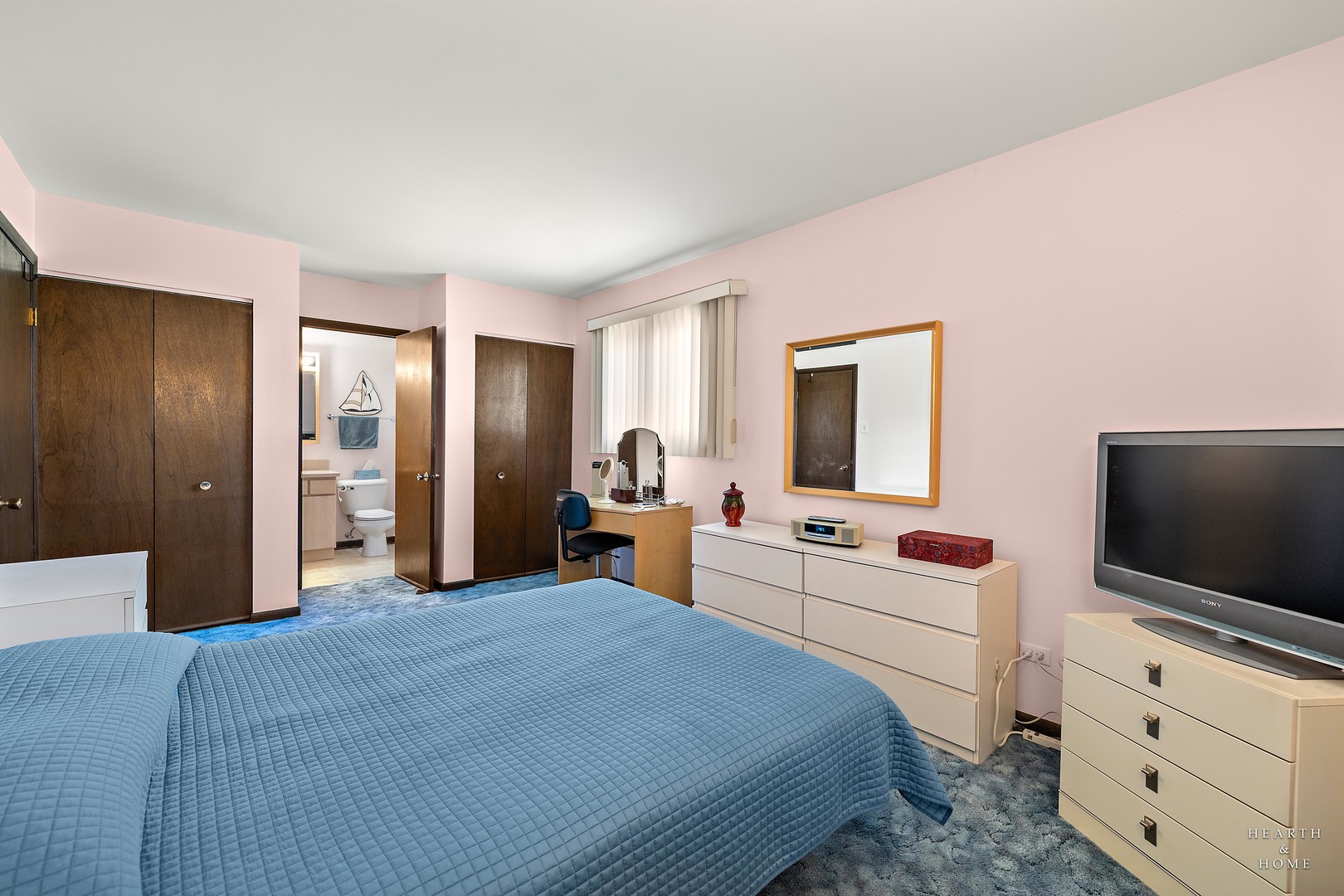 404 Lucille Avenue Fox River Grove, IL 60021 - Photo 16 of 36 a bedroom with a bed and a flat screen tv