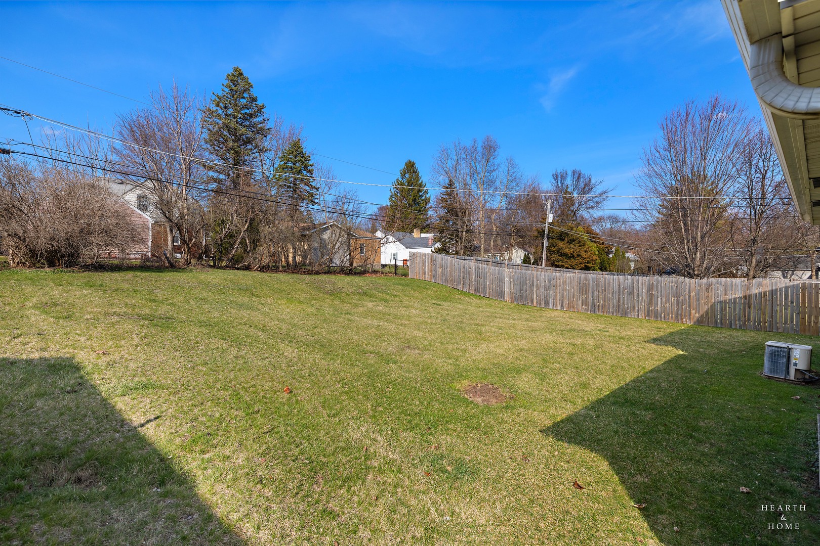 404 Lucille Avenue Fox River Grove, IL 60021 - Photo 27 of 36 a view of a yard with a house in the background