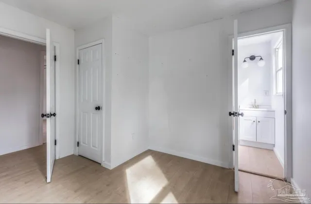 a bathroom with a shower and vanity