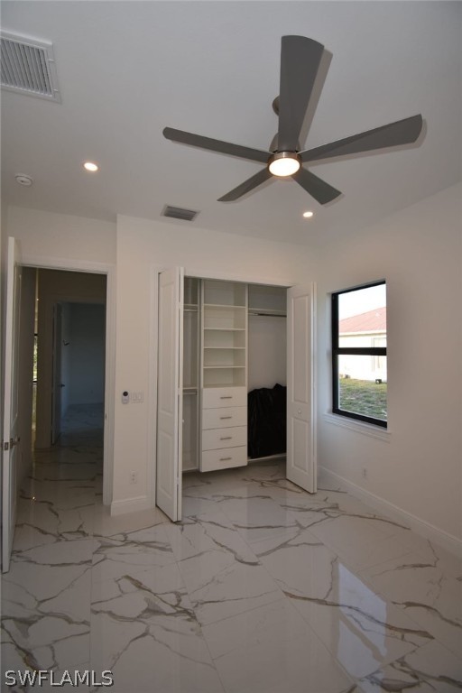 3685 Randall Boulevard Naples, FL 34120 - Photo 16 of 32 a view of a livingroom with a ceiling fan and window