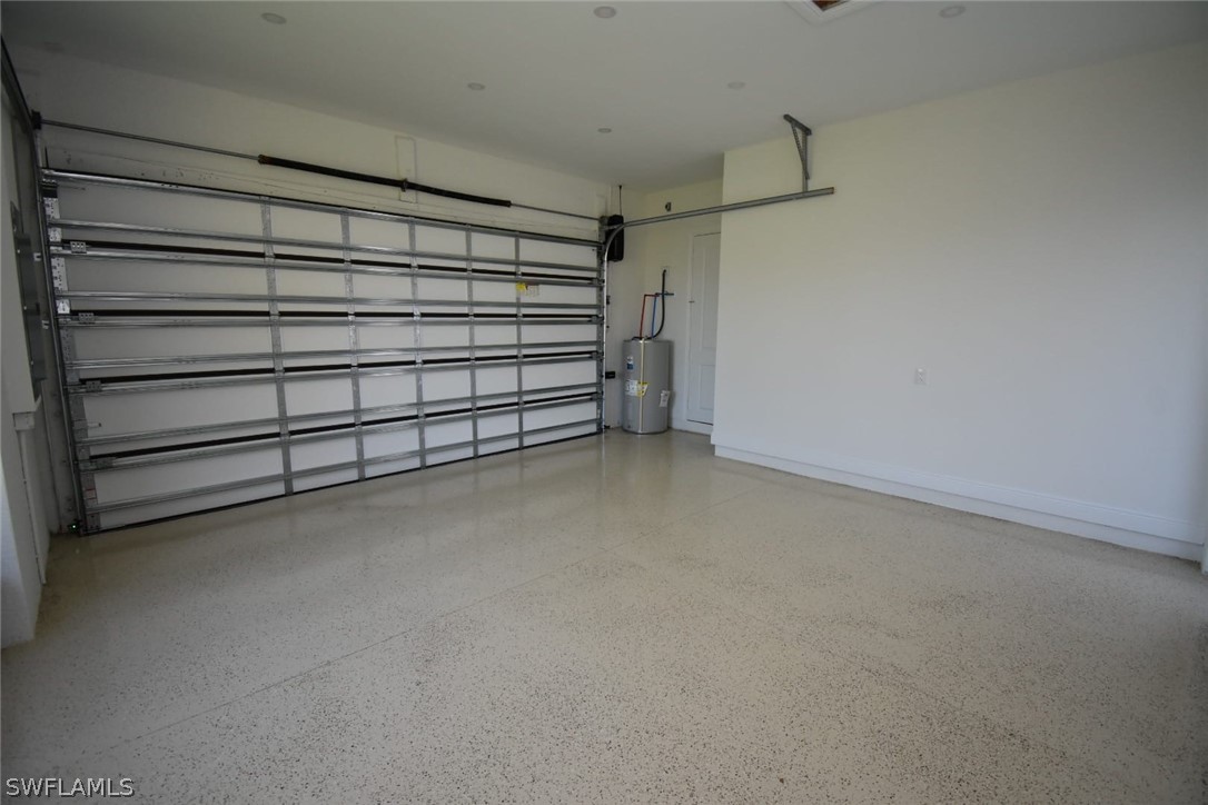 3685 Randall Boulevard Naples, FL 34120 - Photo 29 of 32 a view of an empty garage