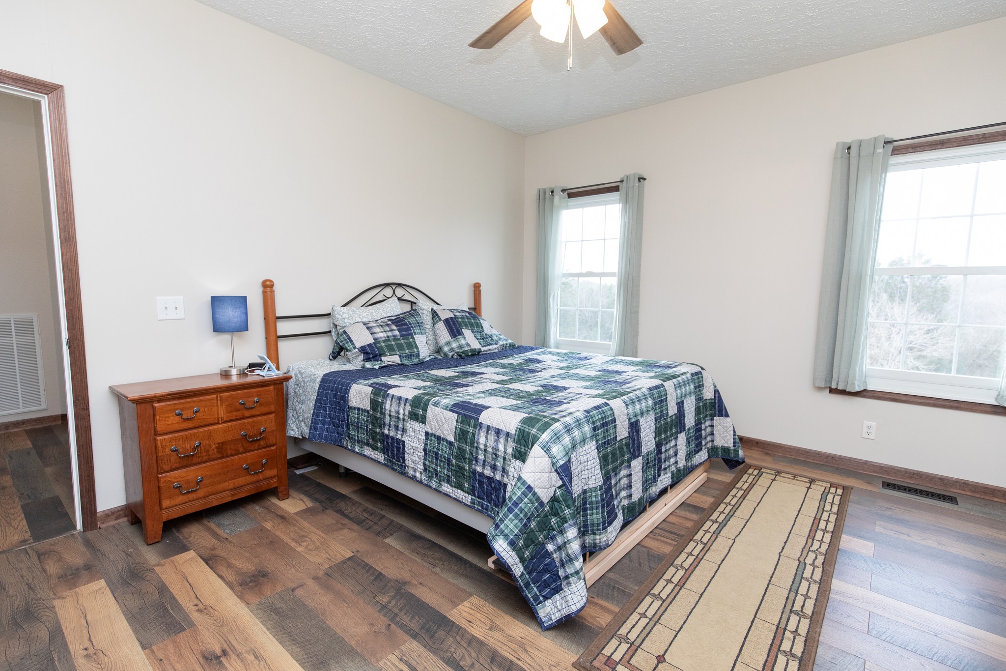 1417 Fairfield Road Westmoreland, TN 37186 - Photo 16 of 47 Another shot of the primary bedroom. Check out the brand new Anderson windows throughout the home!!
