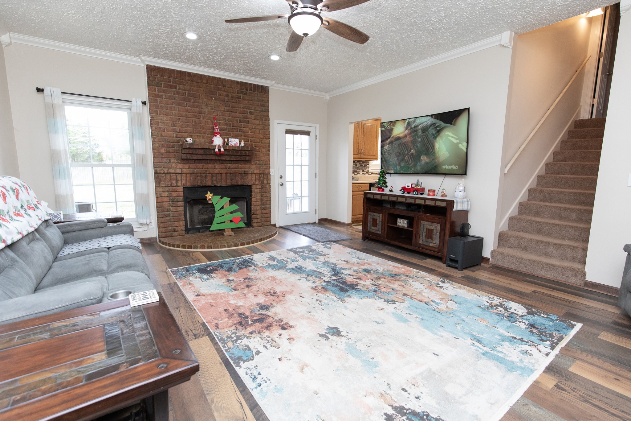 1417 Fairfield Road Westmoreland, TN 37186 - Photo 2 of 47 The living room has a gas fireplace with new logs and burner