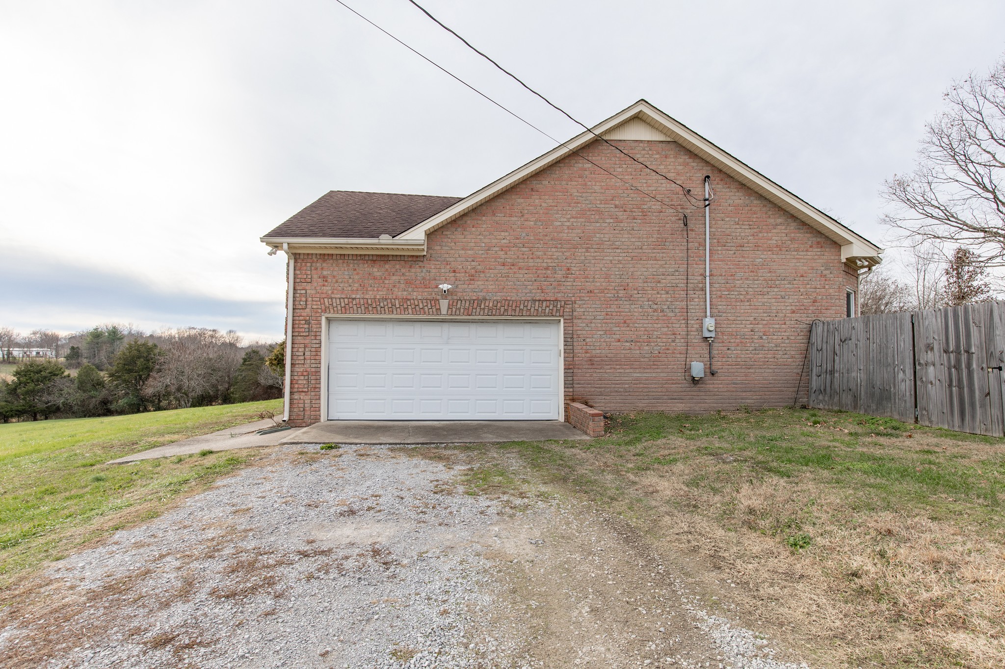 1417 Fairfield Road Westmoreland, TN 37186 - Photo 29 of 47 2 car side attached garage has a concrete pad