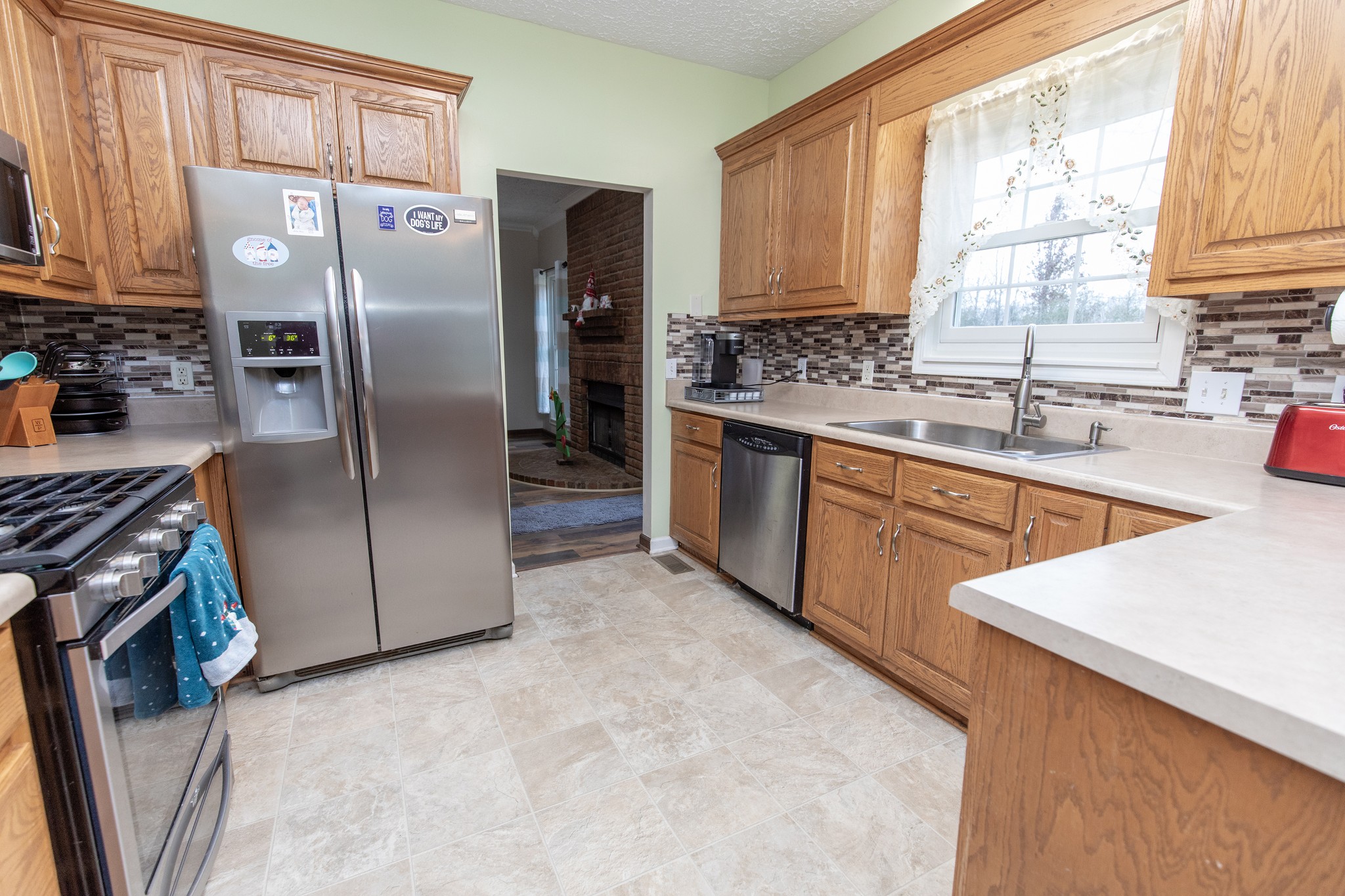 1417 Fairfield Road Westmoreland, TN 37186 - Photo 7 of 47 This kitchen boasts stainless appliances, new backsplash, new disposal, plenty of counter space and cabinets.
