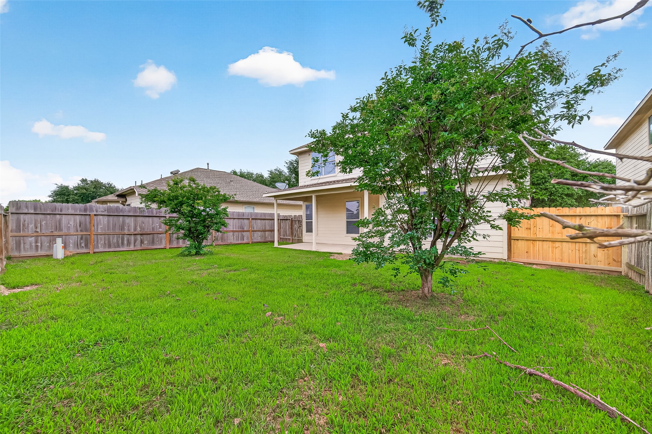 21327 Bella Flora Court Spring, TX 77379 - Photo 50 of 50 a view of an house with backyard space and garden