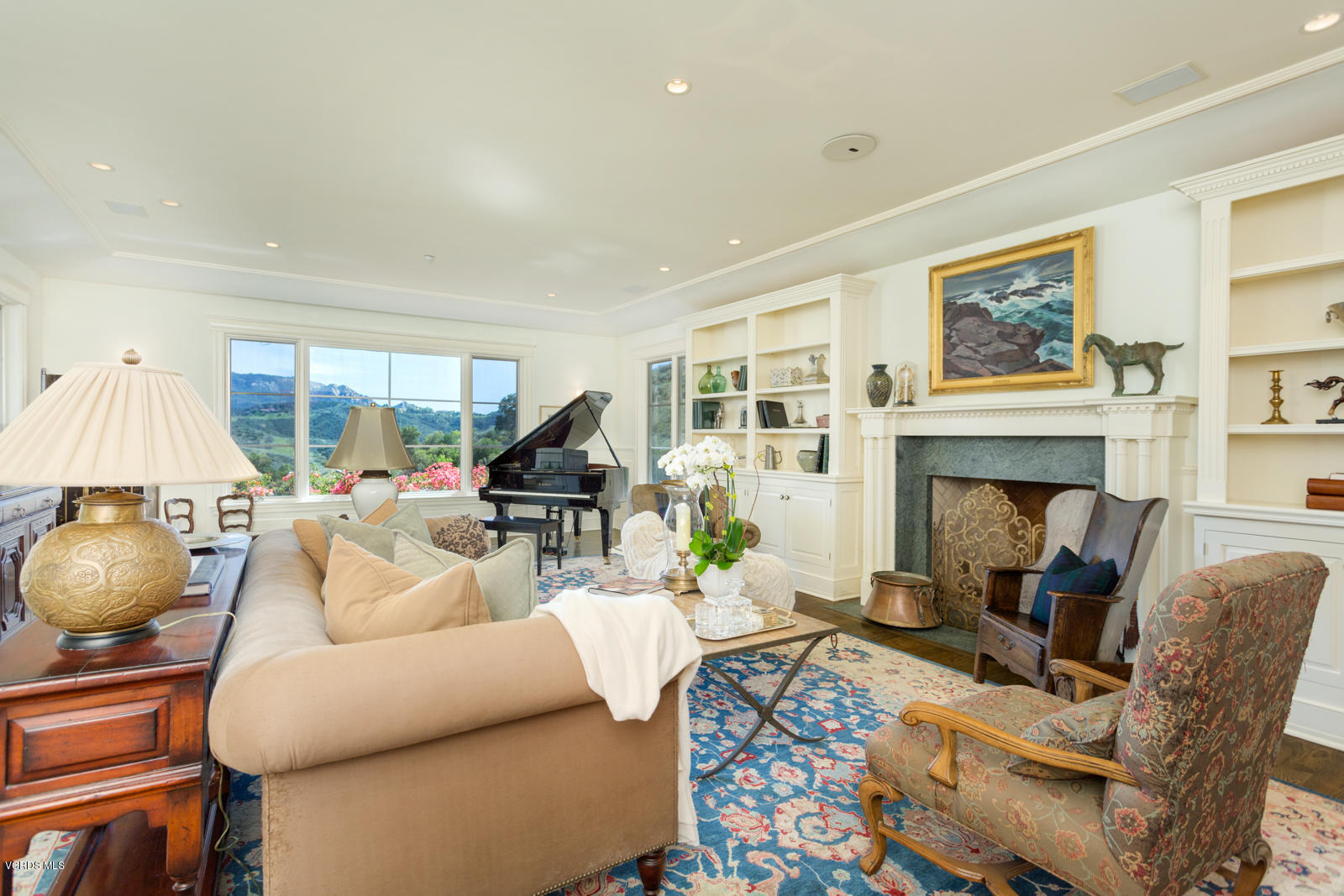 24900 Paseo Del Rancho Road Calabasas, CA 91302 - Photo 13 of 46 a living room with furniture and a fireplace