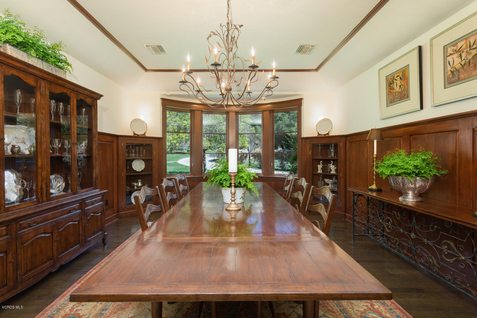 24900 Paseo Del Rancho Road Calabasas, CA 91302 - Photo 14 of 46 a view of a dining room with furniture a chandelier and wooden floor