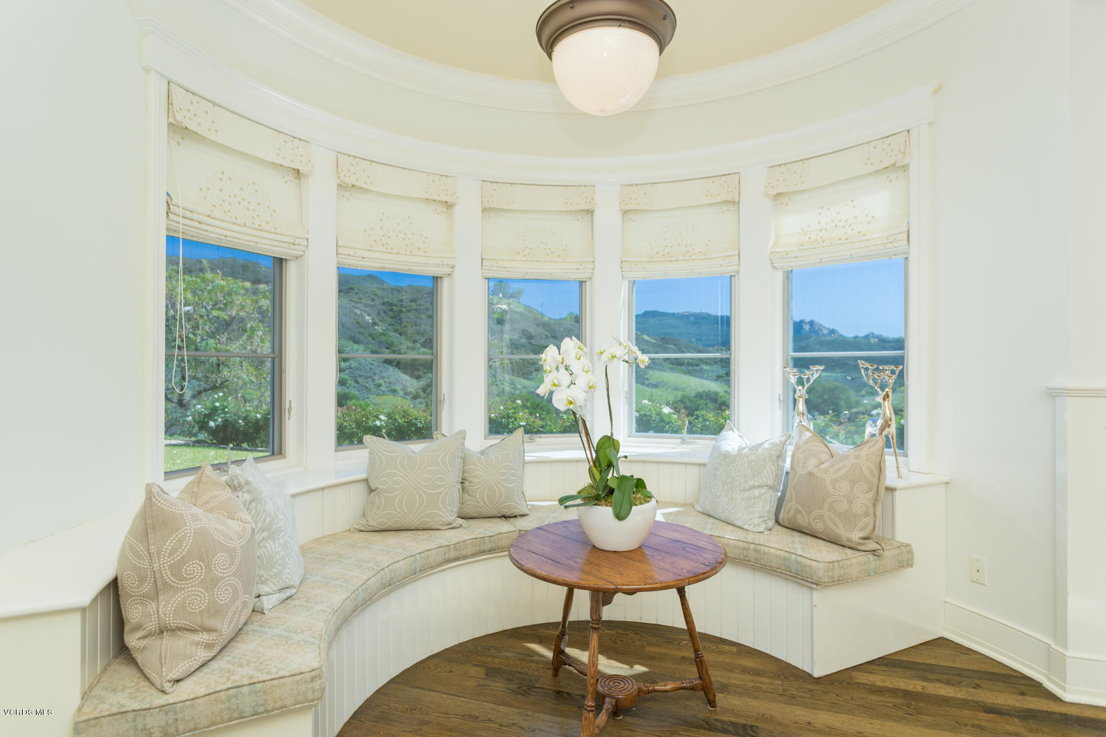 24900 Paseo Del Rancho Road Calabasas, CA 91302 - Photo 15 of 46 a living room with furniture and a large window